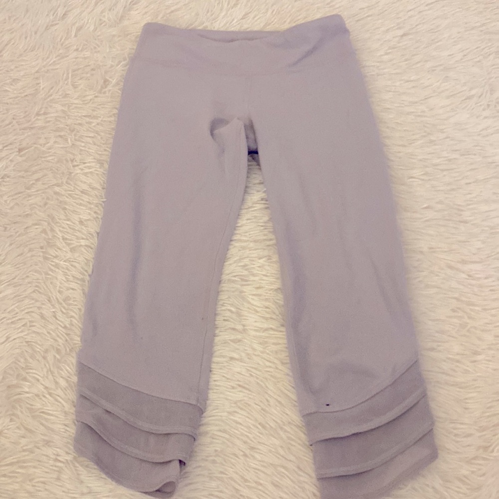 Athleta girls light purple cropped leggings. Mesh details at the bottom